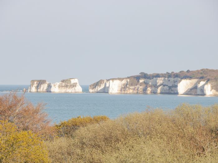 The Penthouse in Swanage, Dorset,allocated off-road parking, roof terrace, pet-free, close to beach.