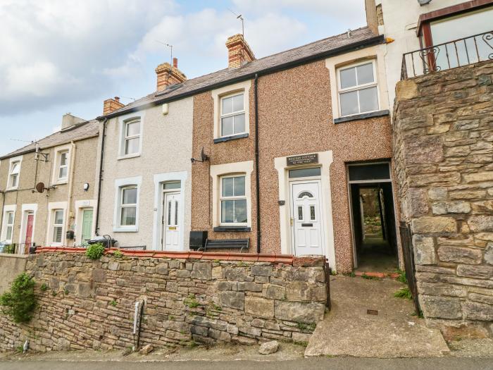 Pebblestone Cottage in Llandudno, Conwy. Three-bedroom cottage resting near the Great Orme landmark.