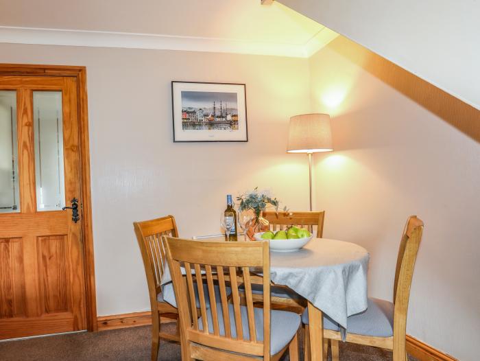 Ty Eiddew (Ivy Cottage), is near Criccieth in Gwynedd. Pet-friendly. Lawned garden. Roadside parking