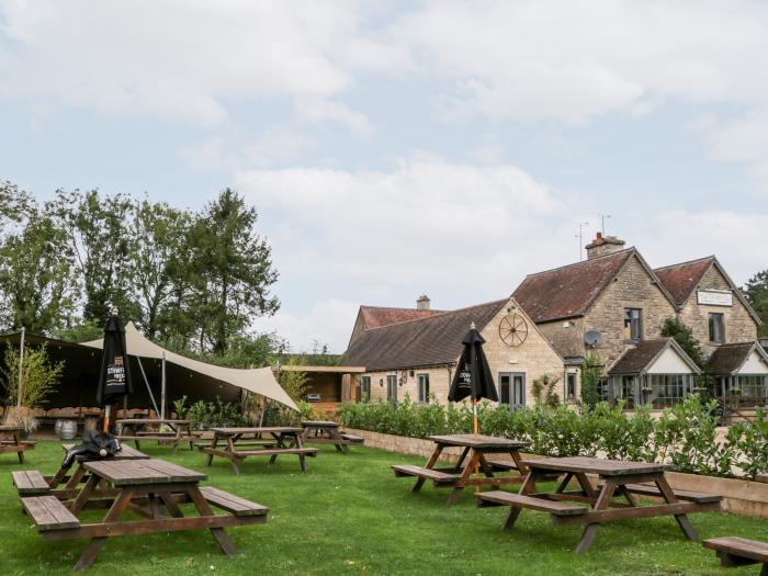 Willow is in Kemble, Gloucestershire. Romantic. Next to a pub. Near Cotswolds AONB. Countryside view