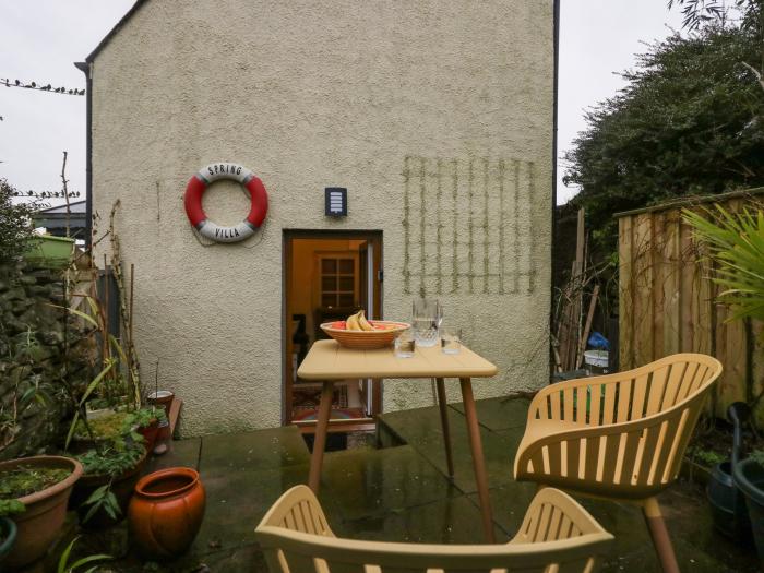 Still Waters, Baycliff, Cumbria. Set paces from the sea. Ideal for couples. Enclosed patio. Two pets