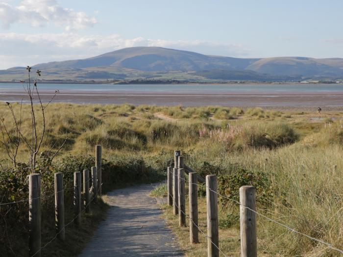 Still Waters, Baycliff, Cumbria. Set paces from the sea. Ideal for couples. Enclosed patio. Two pets