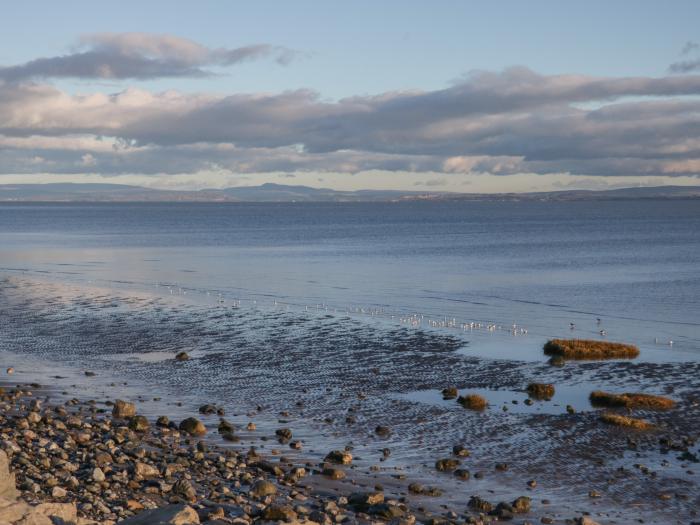 Still Waters, Baycliff, Cumbria. Set paces from the sea. Ideal for couples. Enclosed patio. Two pets