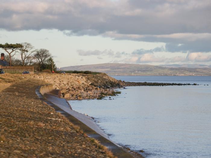 Still Waters, Baycliff, Cumbria. Set paces from the sea. Ideal for couples. Enclosed patio. Two pets