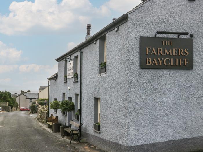 Still Waters, Baycliff, Cumbria. Set paces from the sea. Ideal for couples. Enclosed patio. Two pets