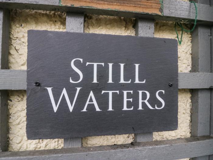 Still Waters, Baycliff, Cumbria. Set paces from the sea. Ideal for couples. Enclosed patio. Two pets