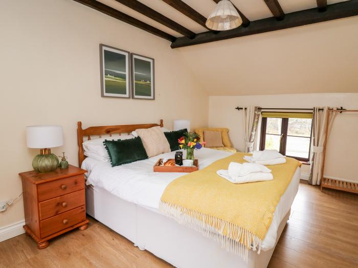 The Woodman is in Nantmel, Mid Wales, off-road parking, pet-friendly, TV, countryside, near a pub,.