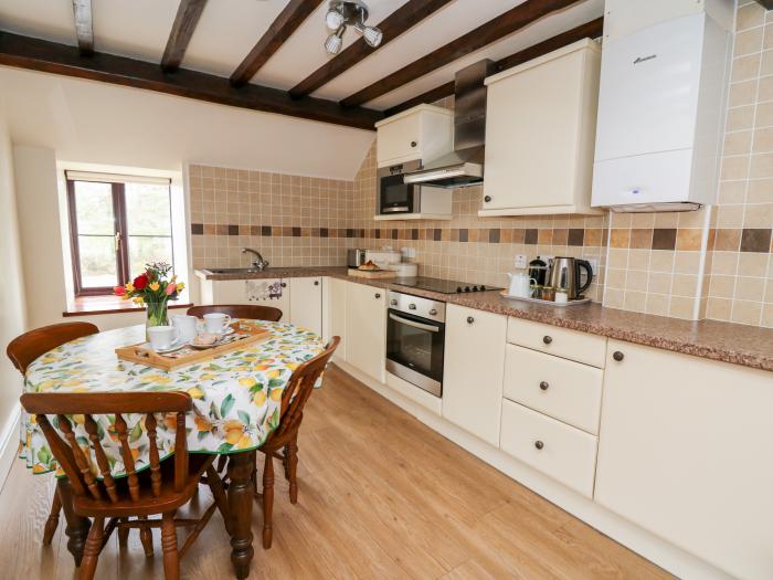 The Woodman is in Nantmel, Mid Wales, off-road parking, pet-friendly, TV, countryside, near a pub,.