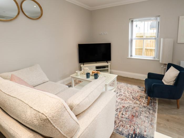 66 Dorchester Road, in Weymouth, Dorset. Ground-floor apartment near beach and amenities. Open-plan.