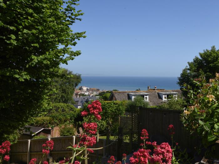 The Old Garage Lyme Regis, Dorset. Off-road parking. Enclosed garden. Dog-friendly. En-suite bedroom