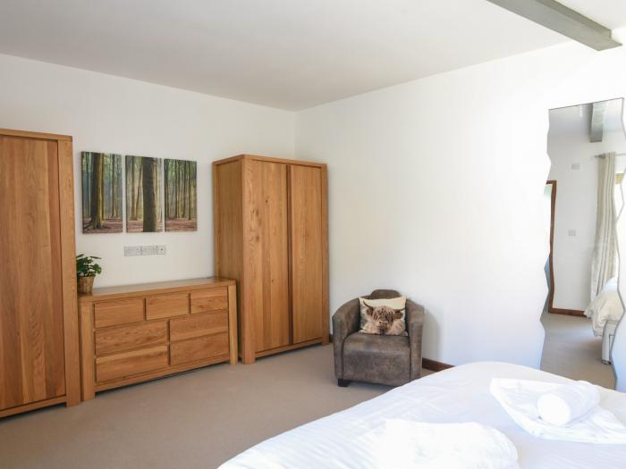 The Old Garage Lyme Regis, Dorset. Off-road parking. Enclosed garden. Dog-friendly. En-suite bedroom