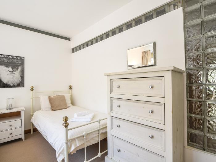 The Old Garage Lyme Regis, Dorset. Off-road parking. Enclosed garden. Dog-friendly. En-suite bedroom