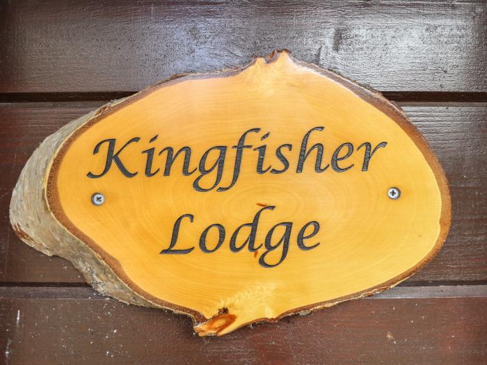 Kingfisher Lodge in Stainfield, Lincolnshire, sleeps six guests in three bedrooms. Two dogs, hot tub