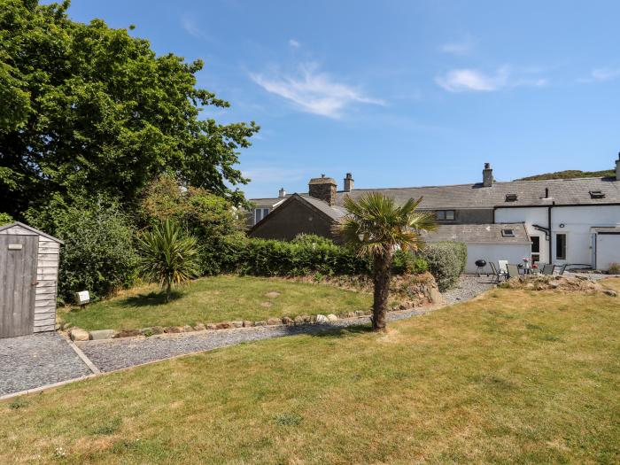 Tan Y Fynwent in Abersoch, Gwynedd, dog-friendly, enclosed garden, close to beach, garden furniture.