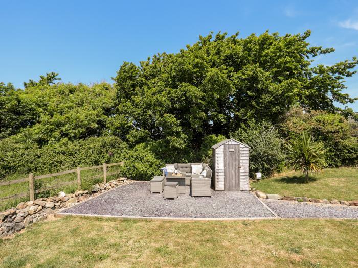 Tan Y Fynwent in Abersoch, Gwynedd, dog-friendly, enclosed garden, close to beach, garden furniture.