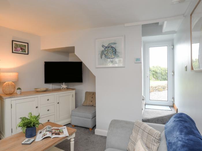 Tan Y Fynwent in Abersoch, Gwynedd, dog-friendly, enclosed garden, close to beach, garden furniture.