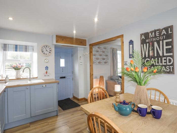 Tan Y Fynwent in Abersoch, Gwynedd, dog-friendly, enclosed garden, close to beach, garden furniture.