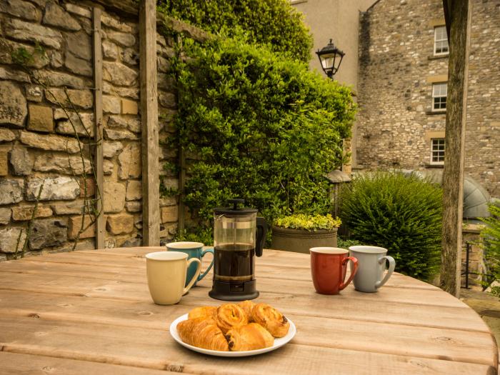 The Mill, Great Longstone in Derbyshire. In National Park. First-floor apartment with shared garden.