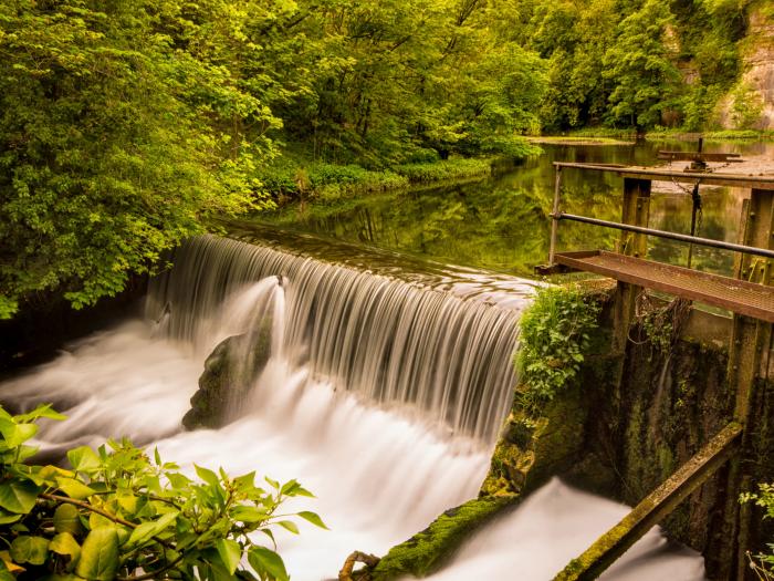 The Mill, Great Longstone in Derbyshire. In National Park. First-floor apartment with shared garden.