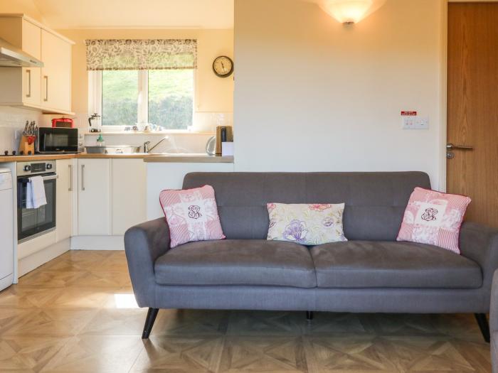 Chalet Log Cabin L15, Combe Martin, dog-friendly, close to beach, open-plan living space and decking