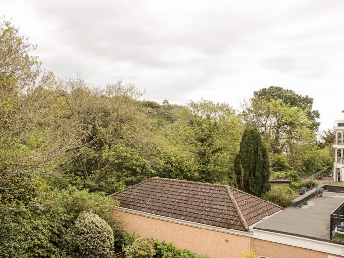 The Moorings, Bournemouth. First-floor apartment. Two bedrooms. Outlook over trees and pet-friendly