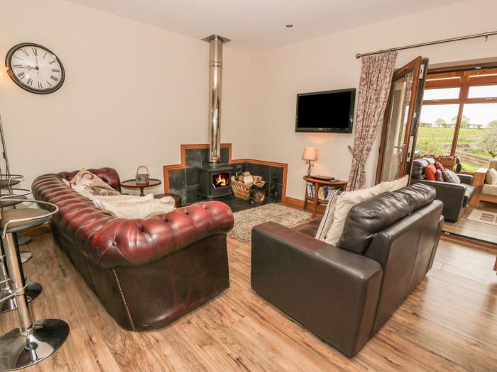 Laird House, Lochmaben, Dumfries and Galloway. Two-bedroom home with woodburning stove. Pet-friendly