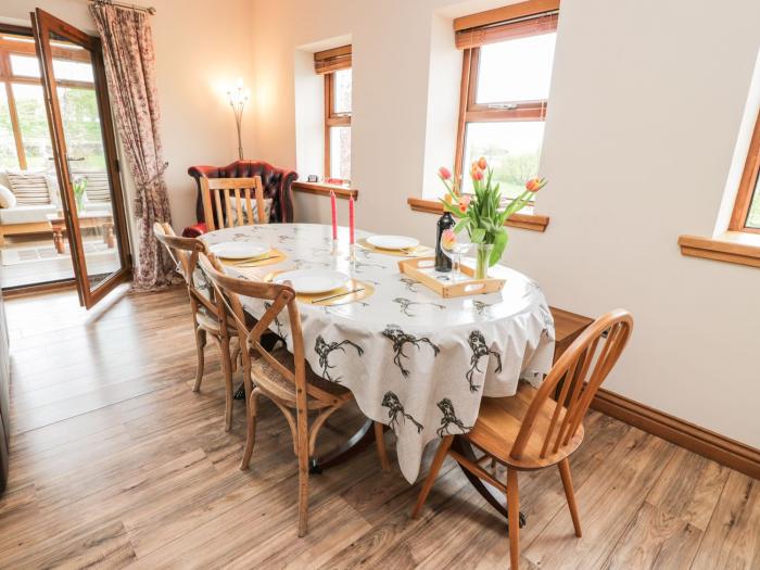 Laird House, Lochmaben, Dumfries and Galloway. Two-bedroom home with woodburning stove. Pet-friendly