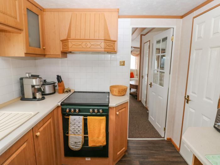 Park Lane near Kilgetty in Pembrokeshire sleeps six in three bedrooms. Family-friendly. Pet-friendly