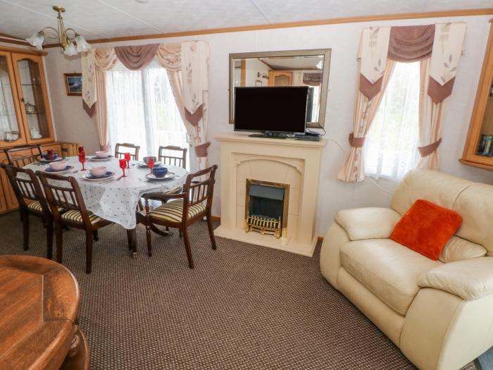 Park Lane near Kilgetty in Pembrokeshire sleeps six in three bedrooms. Family-friendly. Pet-friendly