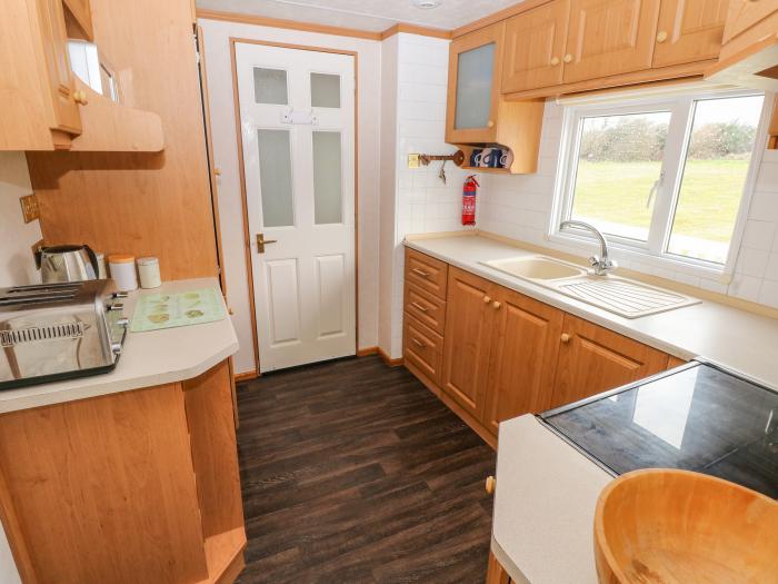 Park Lane near Kilgetty in Pembrokeshire sleeps six in three bedrooms. Family-friendly. Pet-friendly