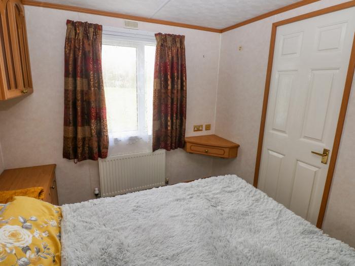 Park Lane near Kilgetty in Pembrokeshire sleeps six in three bedrooms. Family-friendly. Pet-friendly