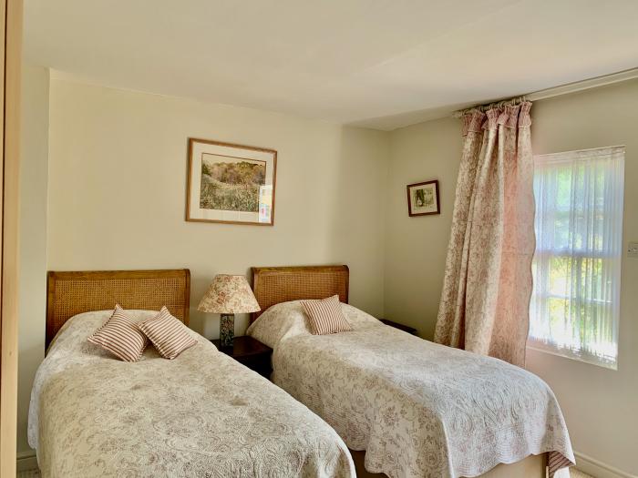 Wisteria Suite is in Dittisham, Devon, designated parking for 2 cars, pet-friendly, private decking.