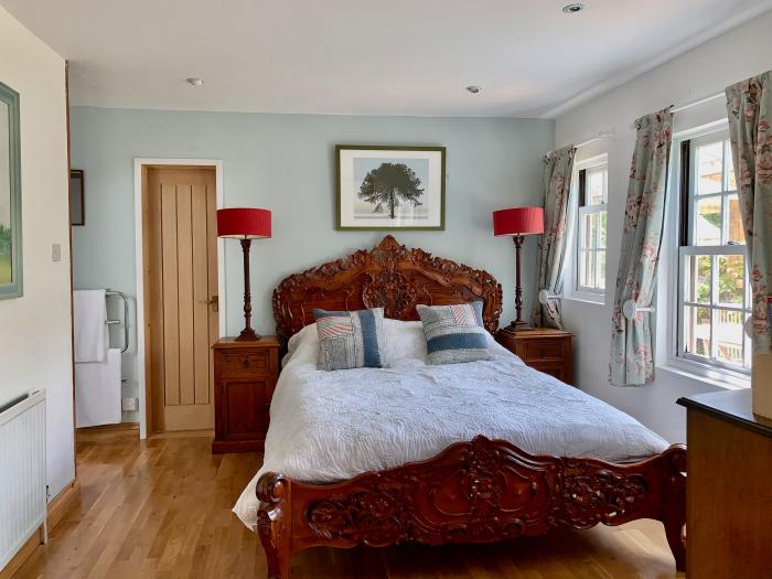 Wisteria Suite is in Dittisham, Devon, designated parking for 2 cars, pet-friendly, private decking.