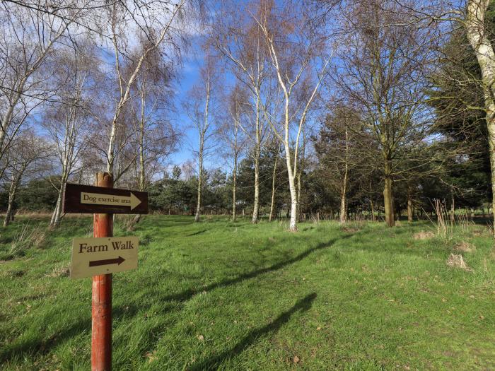 Tawny Lodge in Stainfield, Lincolnshire, sleeps four guests in two bedrooms. Pets & off-road parking