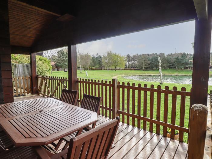 Badger Lodge in Stainfield in Lincolnshire, sleeps four in two bedrooms. Off-road parking and pets.