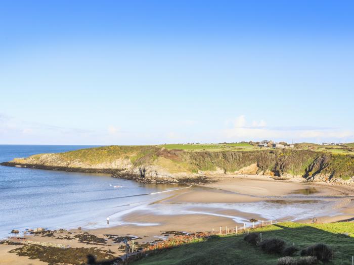 1 Bridge Street, in Cemaes Bay, Anglesey. Near an AONB. Close to amenities and a beach. Dog-friendly