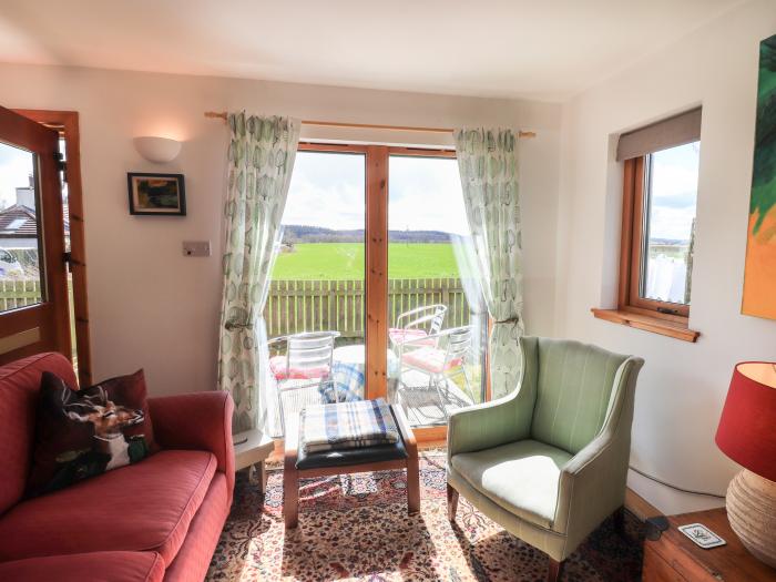 Brodie East Cottage in Forres, Moray, Scotland, parking, private decking, open-plan, near amenities.