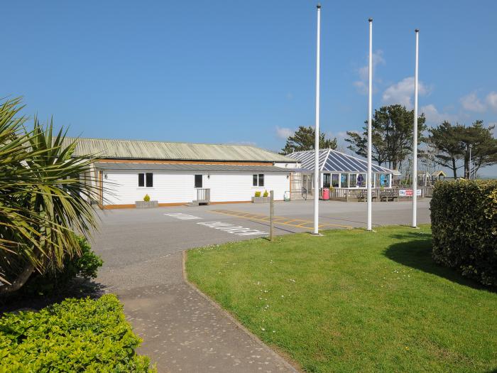 Little Trebah in Atlantic Bays Holiday Park in Cornwall. Decking with furniture. On-site facilities.