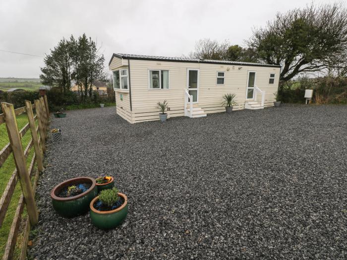 Plembury Cottage Caravan near Whitland, Carmarthenshire. Countryside views and rural. Single-storey.