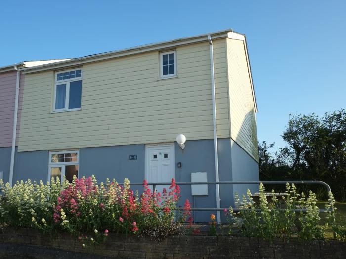 Eventide, Newquay, Cornwall. Four-bedroom home, near amenities. Off-road parking. Open-plan living.