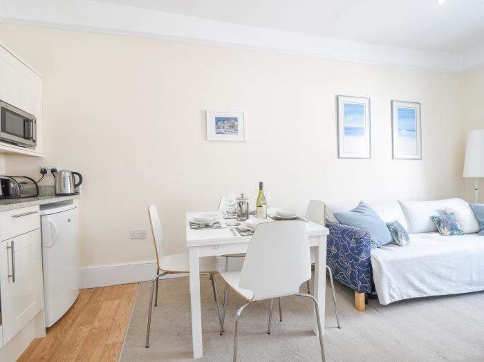 Sublyme, Lyme Regis, Dorset. Second-floor apartment near amenities, attractions and beach. Open-plan