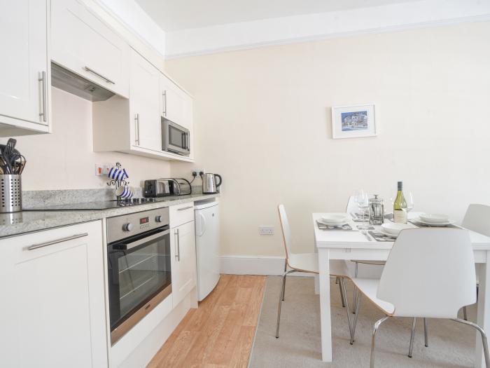 Sublyme, Lyme Regis, Dorset. Second-floor apartment near amenities, attractions and beach. Open-plan