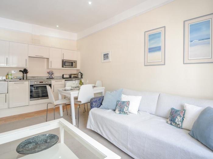 Sublyme, Lyme Regis, Dorset. Second-floor apartment near amenities, attractions and beach. Open-plan