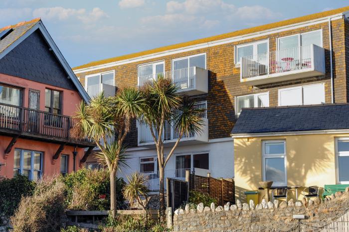 3 Bay View Court in Lyme Regis, Dorset. First-floor apartment. Balcony with furniture. Beach nearby.