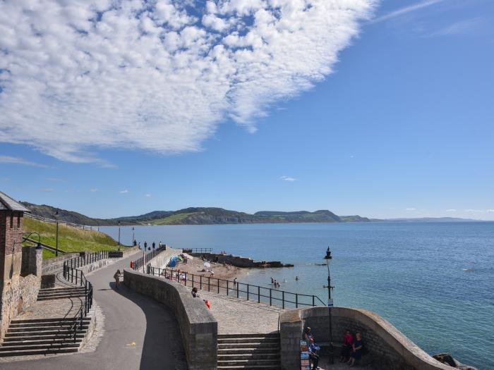 3 Bay View Court in Lyme Regis, Dorset. First-floor apartment. Balcony with furniture. Beach nearby.