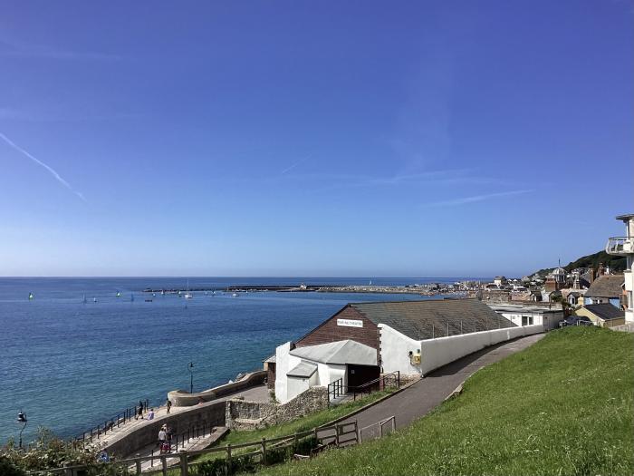 3 Bay View Court in Lyme Regis, Dorset. First-floor apartment. Balcony with furniture. Beach nearby.