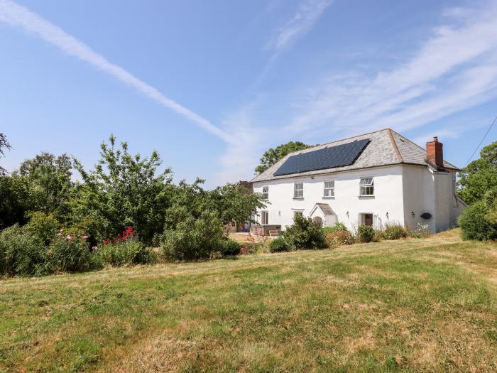 Upcott Farm in Morchard Bishop, Devon. Detached farmhouse. Country setting. Extensive garden. Pets.