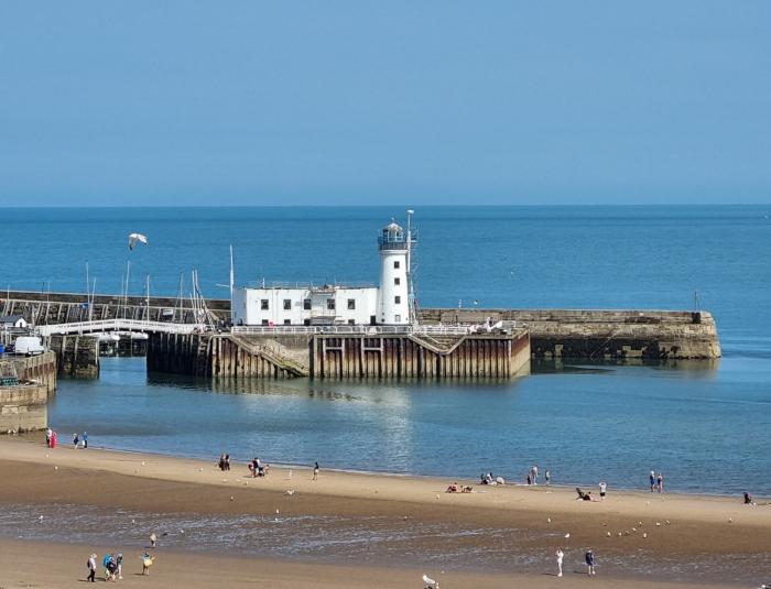 The Seahome is in Scarborough, North Yorkshire. Adults-only apartment. Sea/beach views. Beachfront.