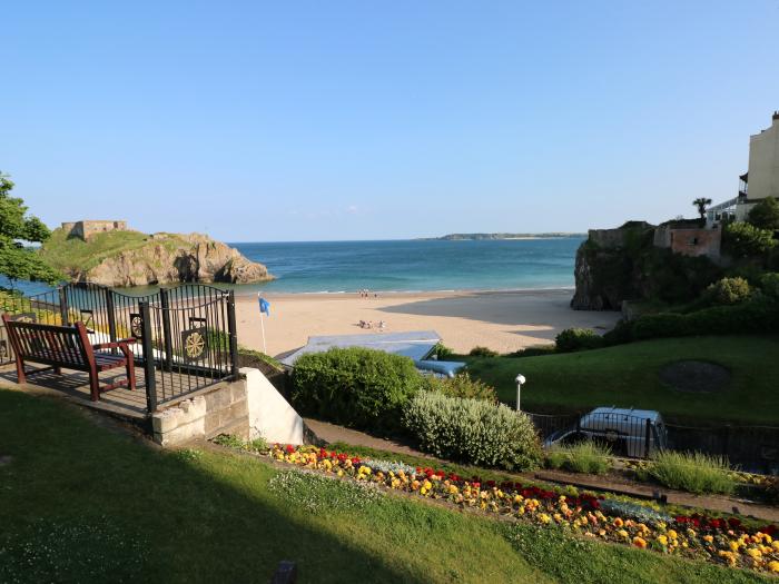 Westwinds in Tenby, Pembrokeshire. Designated parking. Near a shop and pub. Travel cot and highchair