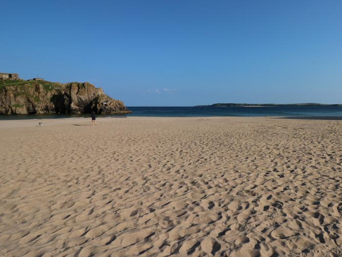 Westwinds in Tenby, Pembrokeshire. Designated parking. Near a shop and pub. Travel cot and highchair